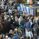 People line up after cancelled flights at Gatwick Airport cause confusion on December 20, 2018